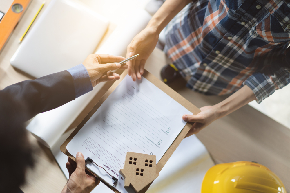 Signing paperwork to renew your lease